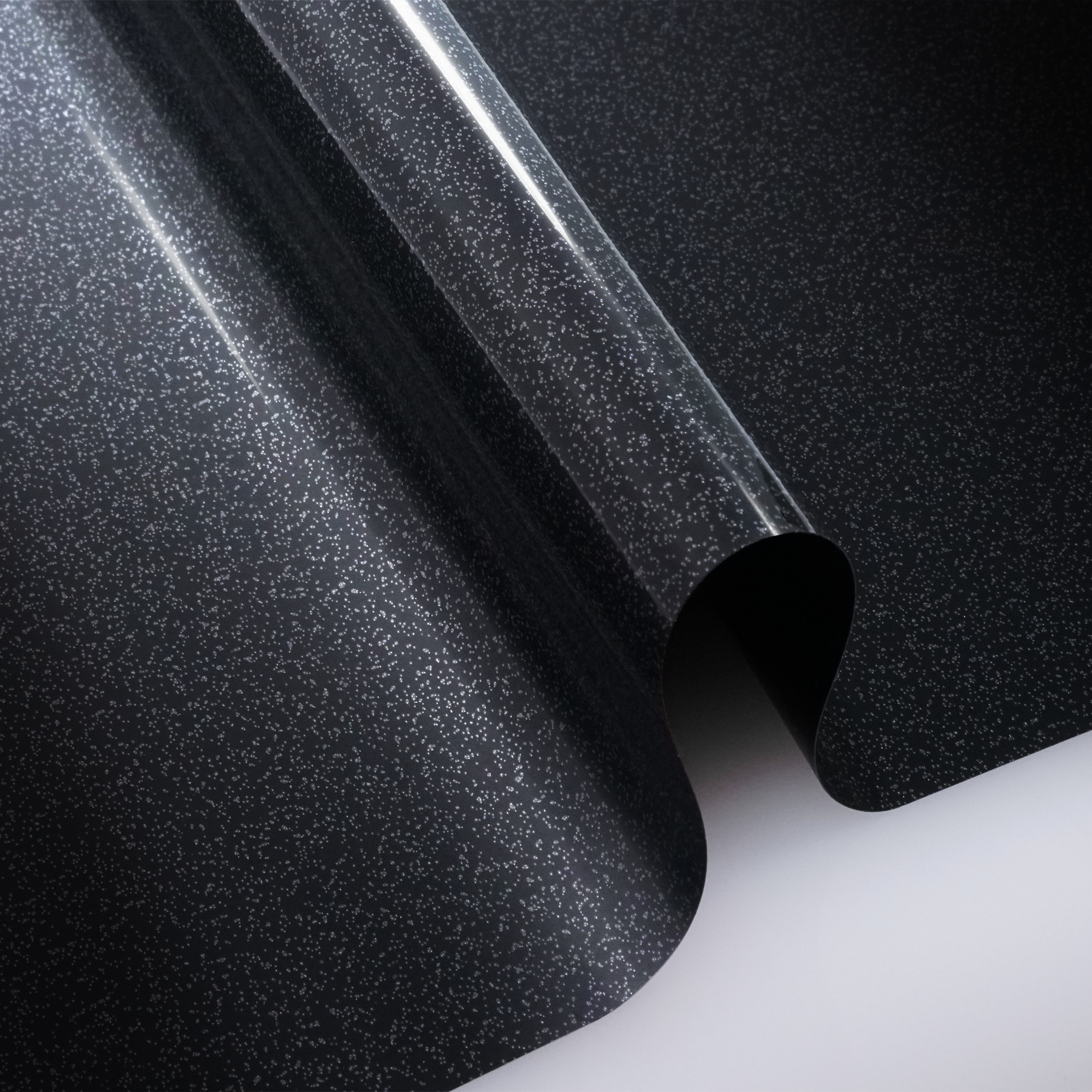 reflective accents on a metallic glossy black vinyl wrap