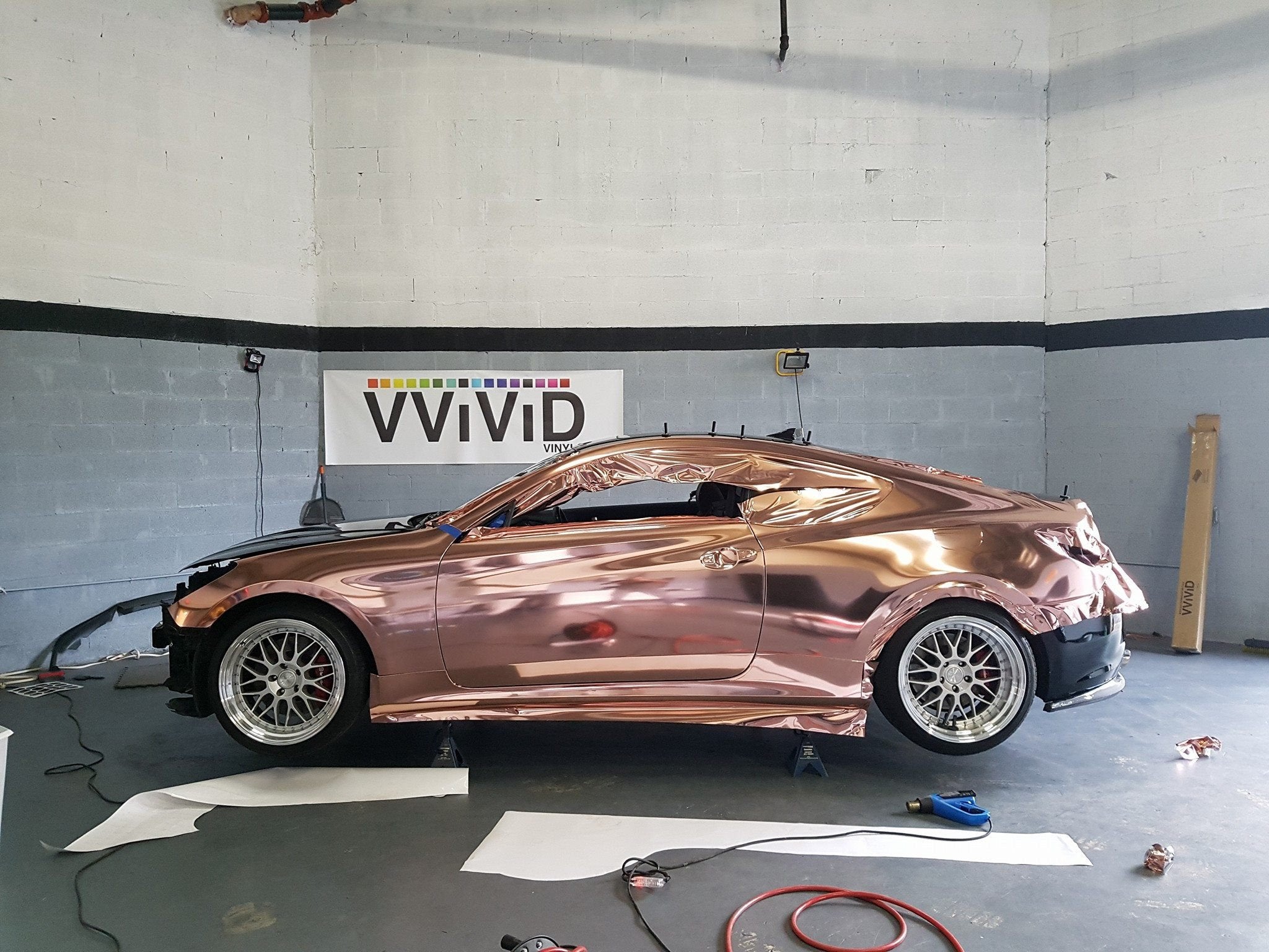 n-am wrapped in Avery rose gold chrome with a lv print